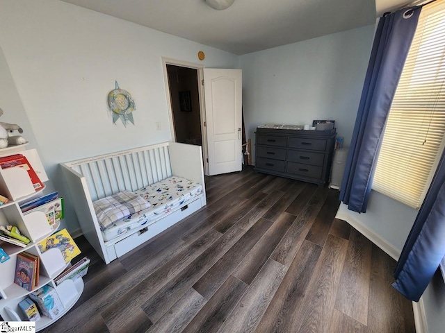 bedroom with wood finished floors