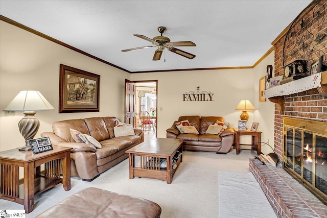 carpeted living area featuring a fireplace, a ceiling fan, and ornamental molding