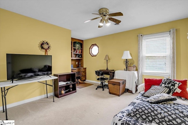 bedroom featuring carpet, baseboards, and ceiling fan