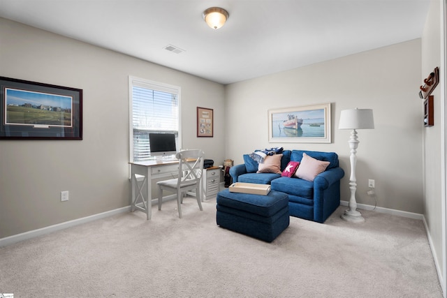 living area with visible vents, carpet flooring, and baseboards