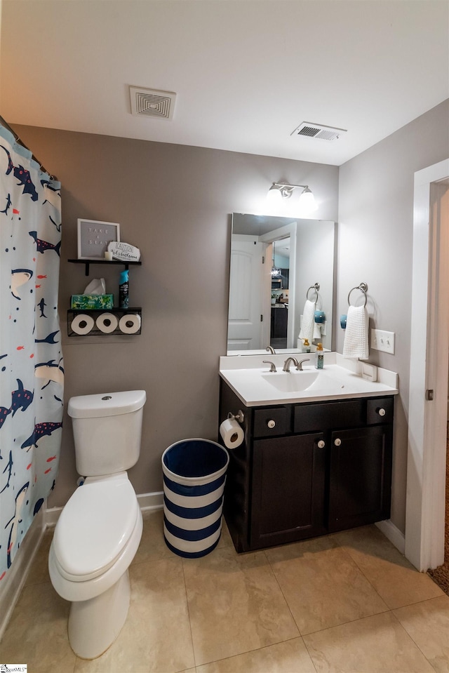 bathroom with visible vents, toilet, curtained shower, and vanity