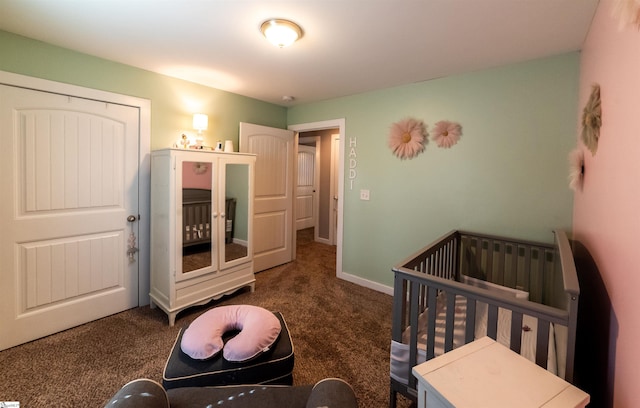 carpeted bedroom featuring baseboards