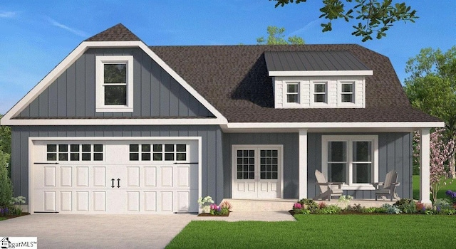 view of front of property featuring a front yard, covered porch, concrete driveway, a garage, and board and batten siding