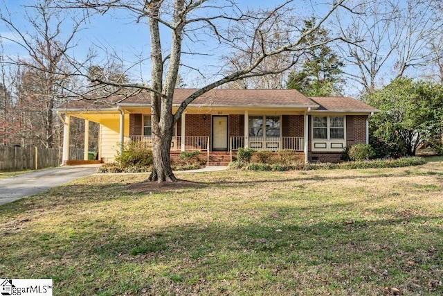 single story home with brick siding, covered porch, a front lawn, and fence