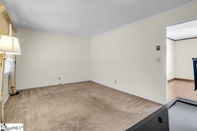 unfurnished living room featuring light carpet, baseboards, and ornamental molding