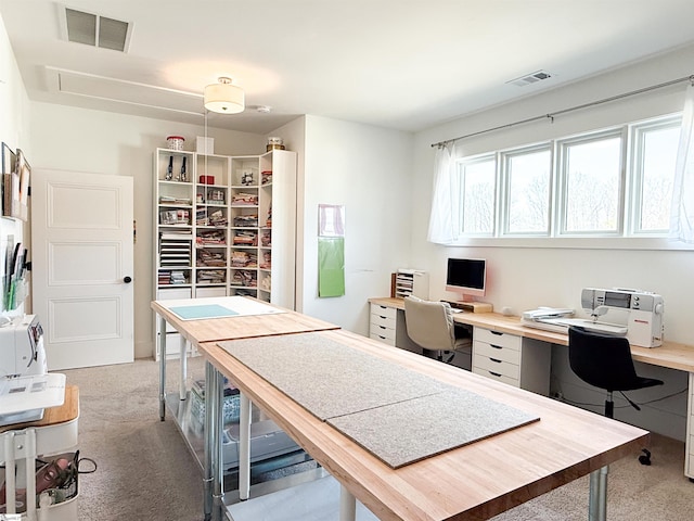 office space featuring light carpet and visible vents