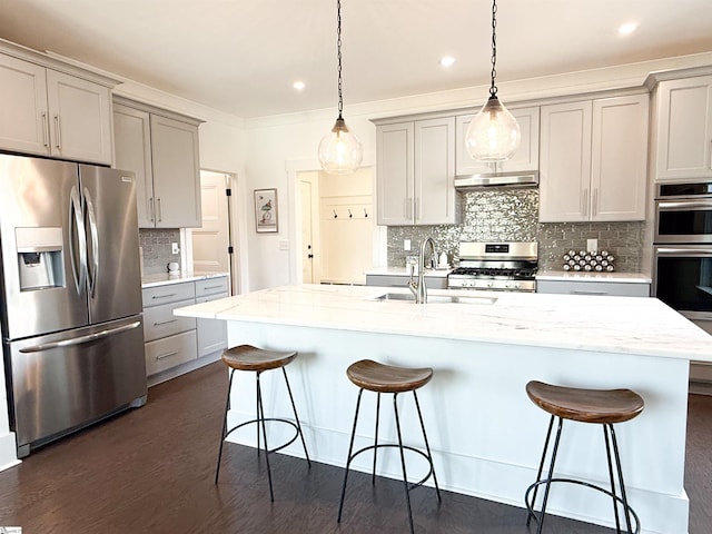 kitchen with gray cabinets, appliances with stainless steel finishes, and a sink