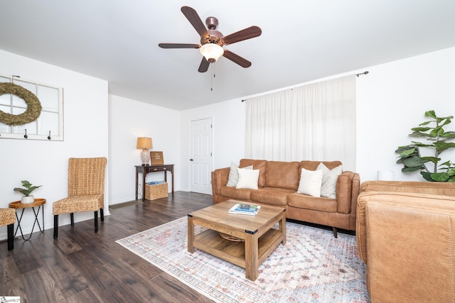 living room with ceiling fan and wood finished floors