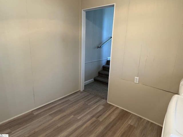 unfurnished bedroom with wood finished floors