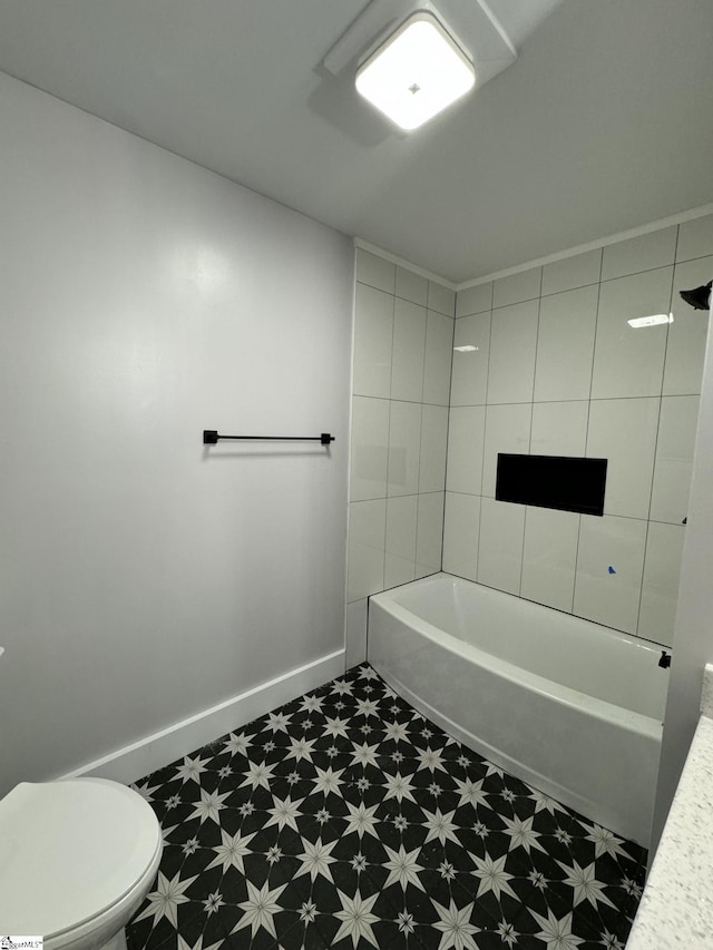 full bath featuring tile patterned floors, baseboards, and toilet