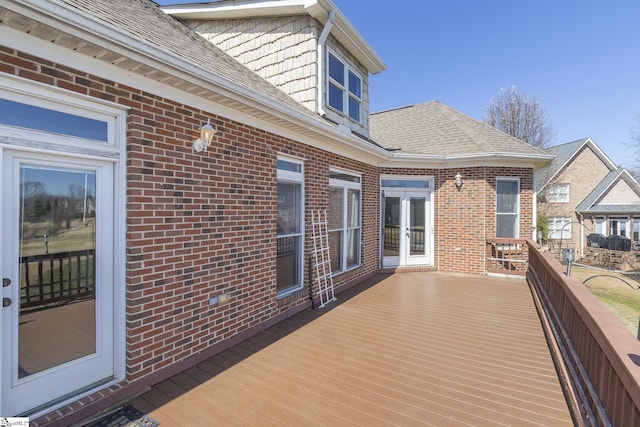 wooden deck featuring french doors