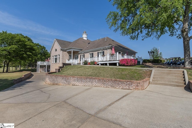 view of front of home with a front yard