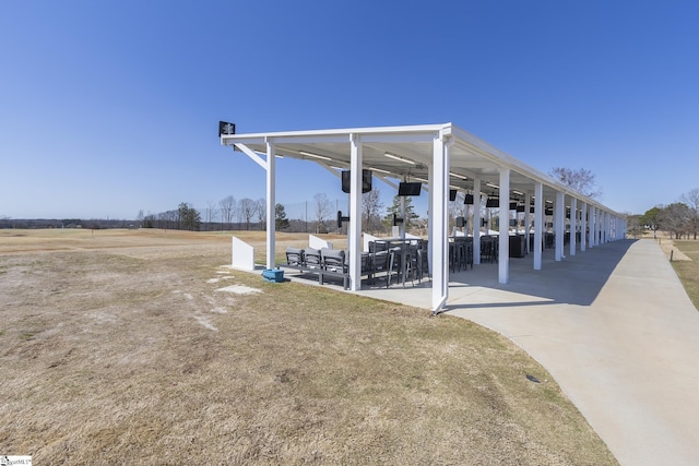 exterior space with ceiling fan