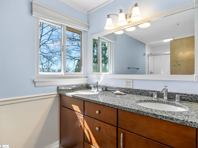 145 Dickson Rd, Campobello, SC 29322 - full bathroom featuring double vanity, crown molding, a stall shower, and a sink