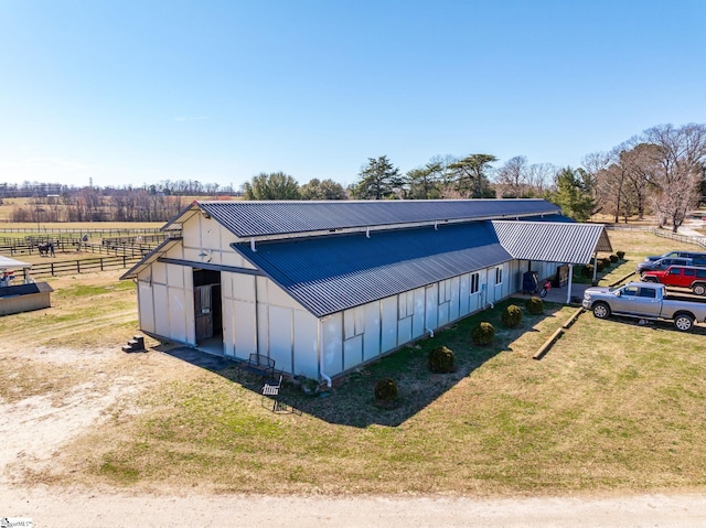 145 Dickson Rd, Campobello, SC 29322 - view of front facade with a rural view, fence, a front yard, metal roof, and an outbuilding