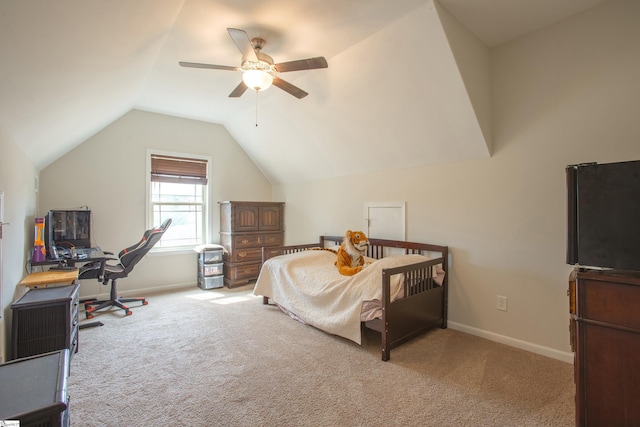 bedroom with baseboards, lofted ceiling, carpet, and a ceiling fan