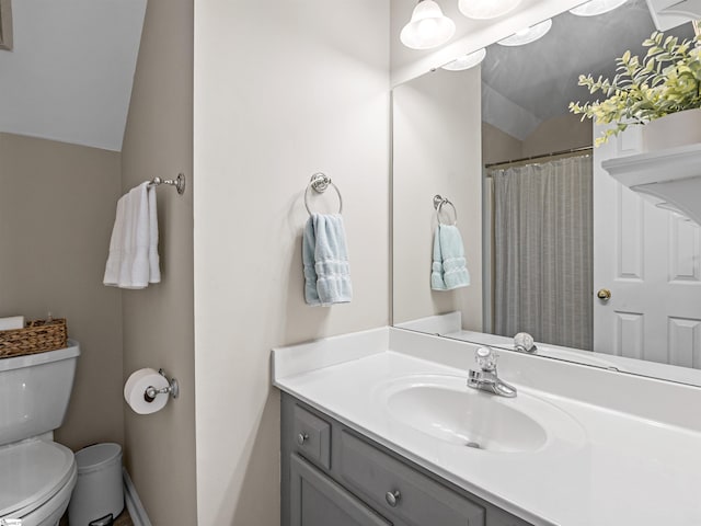 full bathroom with vanity, vaulted ceiling, toilet, and a shower with shower curtain