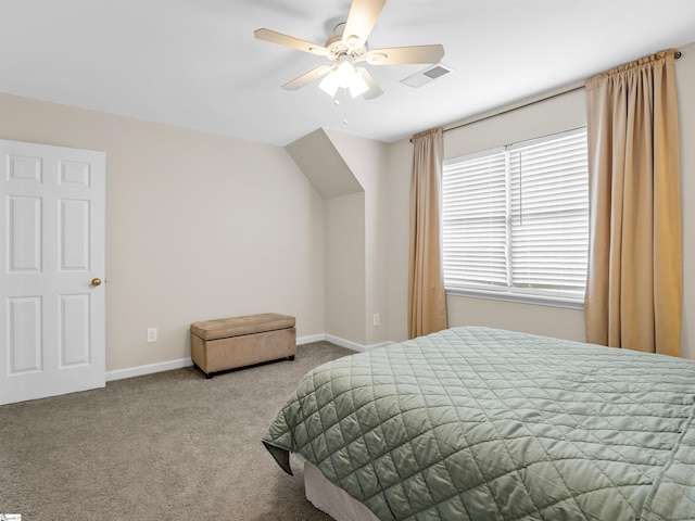 carpeted bedroom featuring visible vents, ceiling fan, and baseboards