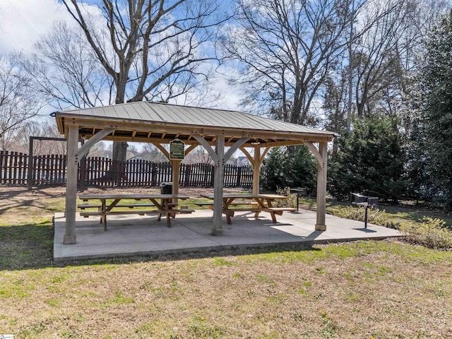 view of community with a gazebo and fence