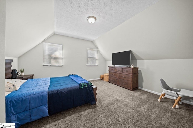 carpeted bedroom featuring a textured ceiling, baseboards, and vaulted ceiling