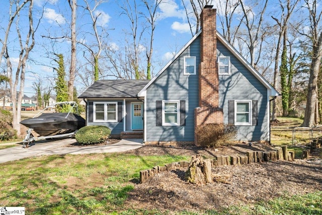 view of front of house with a chimney