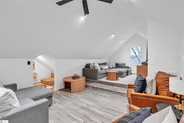 additional living space with lofted ceiling, light wood-style floors, and ceiling fan