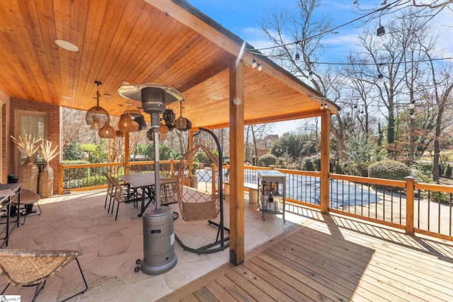deck with outdoor dining space
