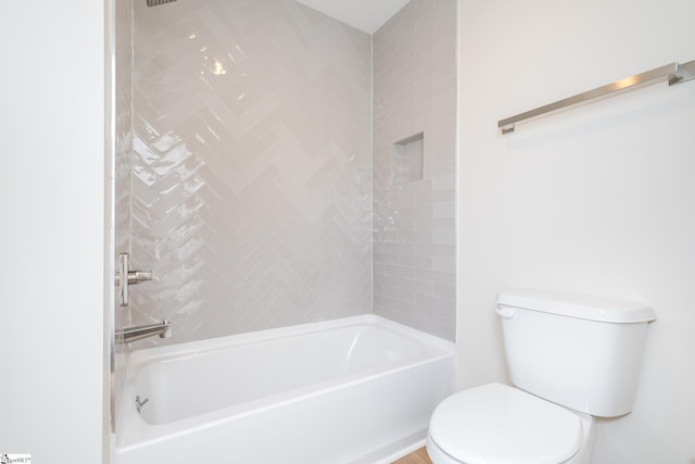 full bathroom featuring bathtub / shower combination and toilet
