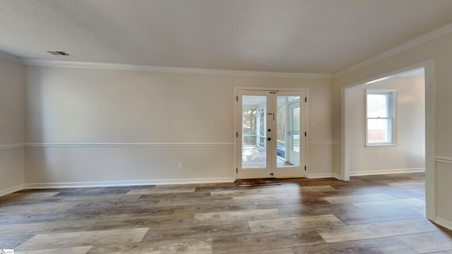 20 Woodbine Ct, Spartanburg, SC 29307 - spare room with french doors, crown molding, baseboards, and wood finished floors
