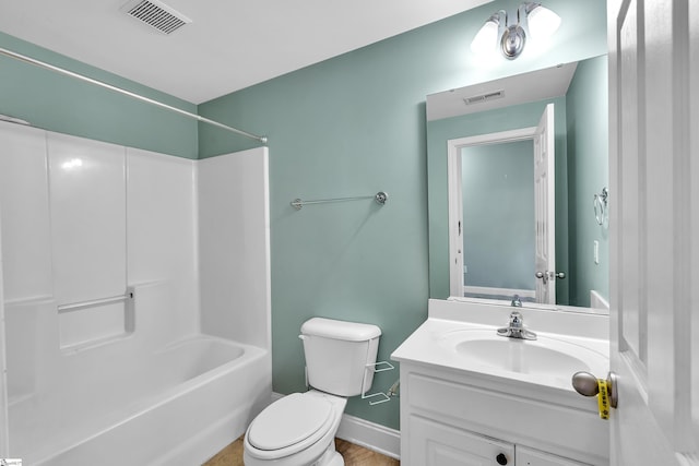 bathroom with visible vents, toilet, vanity, and shower / tub combination