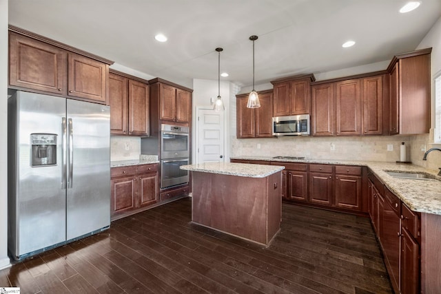 16 Verdana Ct, Simpsonville, SC 29680 - kitchen featuring a sink, tasteful backsplash, appliances with stainless steel finishes, and dark wood finished floors