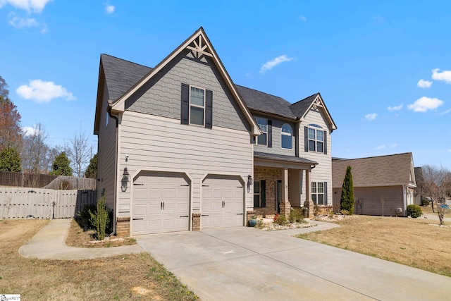 16 Verdana Ct, Simpsonville, SC 29680 - view of front facade with a front yard, concrete driveway, an attached garage, and fence