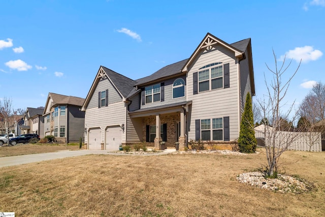 16 Verdana Ct, Simpsonville, SC 29680 - view of front of house featuring a front lawn, fence, a garage, and driveway