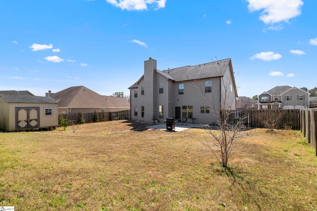 16 Verdana Ct, Simpsonville, SC 29680 - back of property with a yard, a shed, an outdoor structure, and a patio