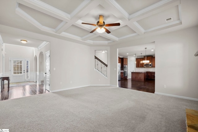 16 Verdana Ct, Simpsonville, SC 29680 - unfurnished living room featuring visible vents, beamed ceiling, dark carpet, coffered ceiling, and a ceiling fan