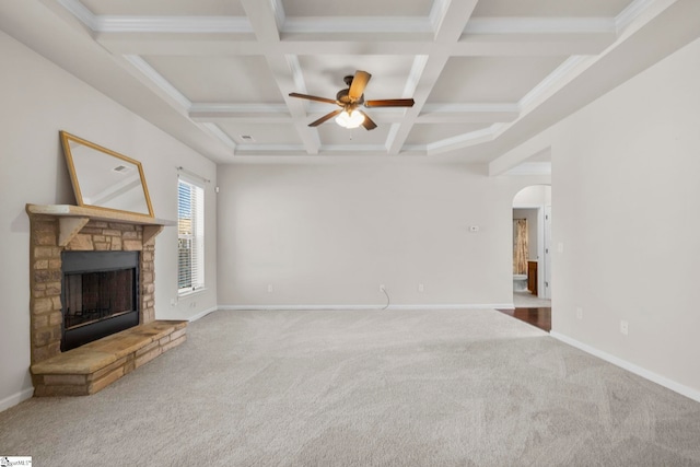 16 Verdana Ct, Simpsonville, SC 29680 - unfurnished living room with baseboards, carpet, a fireplace, arched walkways, and a ceiling fan