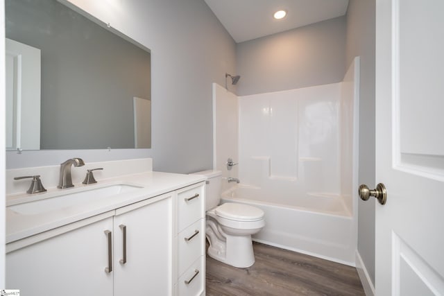 313 Barker Rd, Simpsonville, SC 29680 - bathroom with vanity, toilet, wood finished floors, and shower / bathtub combination