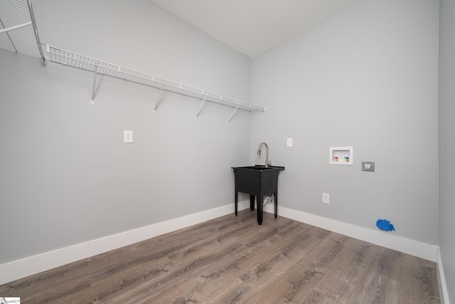 313 Barker Rd, Simpsonville, SC 29680 - laundry room featuring wood finished floors, baseboards, hookup for a washing machine, and laundry area