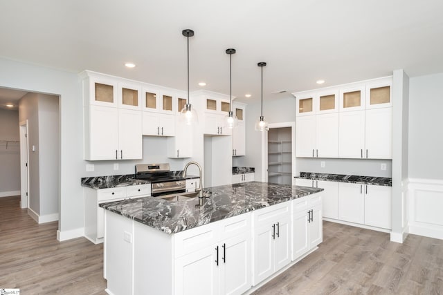 313 Barker Rd, Simpsonville, SC 29680 - kitchen featuring light wood finished floors, recessed lighting, stainless steel range with electric cooktop, and white cabinets