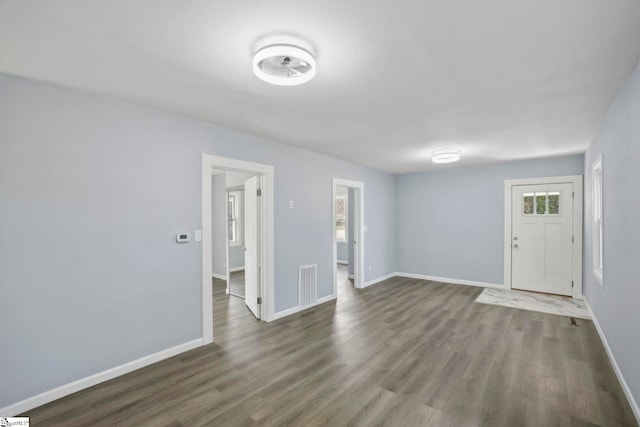 222 Poplar St, Gaffney, SC 29341 - unfurnished room with wood finished floors, visible vents, and baseboards