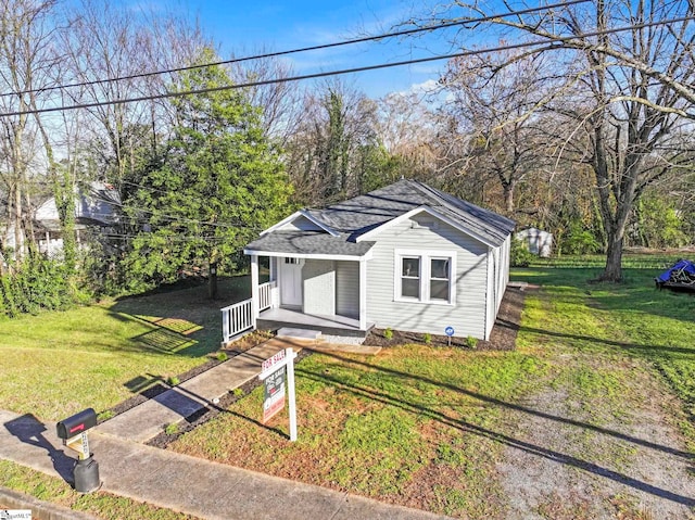 222 Poplar St, Gaffney, SC 29341 - bungalow-style house featuring a front lawn, covered porch, and a shingled roof