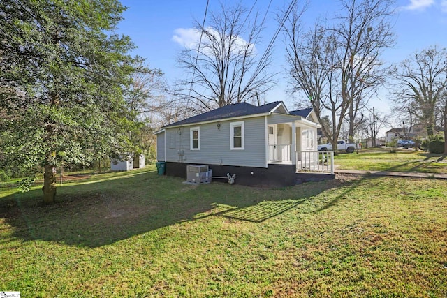 222 Poplar St, Gaffney, SC 29341 - rear view of property with crawl space, a lawn, and central AC