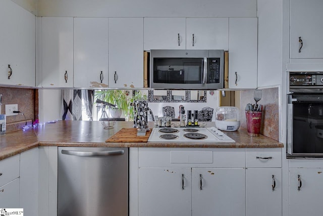 129 Canty Way, Gaffney, SC 29341 - kitchen featuring tasteful backsplash, appliances with stainless steel finishes, and white cabinets