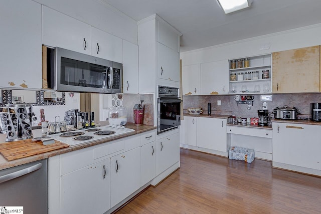 129 Canty Way, Gaffney, SC 29341 - kitchen featuring open shelves, light wood-style flooring, stainless steel appliances, white cabinetry, and tasteful backsplash