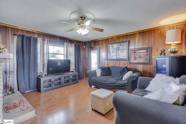 129 Canty Way, Gaffney, SC 29341 - living room featuring light wood-type flooring, ceiling fan, and wood walls