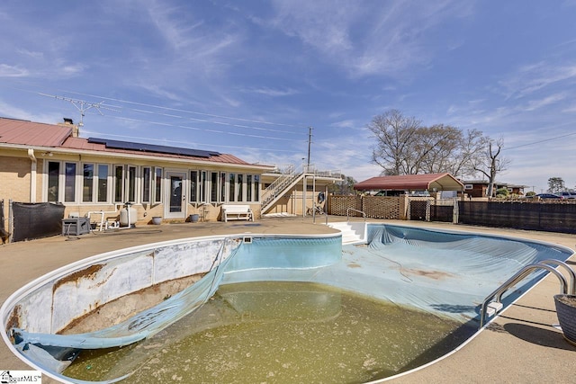 129 Canty Way, Gaffney, SC 29341 - view of swimming pool with a patio, a fenced backyard, a fenced in pool, and a sunroom