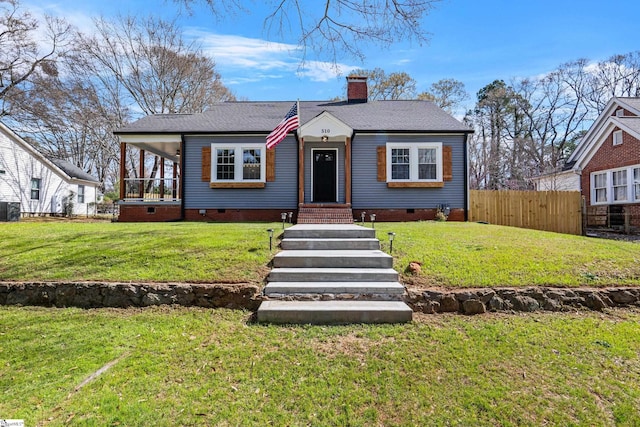 510 N Franklin Rd, Greenville, SC 29609 - bungalow featuring a front lawn, fence, a shingled roof, crawl space, and a chimney