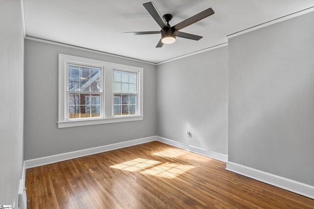 510 N Franklin Rd, Greenville, SC 29609 - empty room with wood finished floors, baseboards, ceiling fan, and ornamental molding