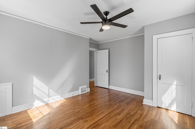 510 N Franklin Rd, Greenville, SC 29609 - unfurnished bedroom with wood finished floors, visible vents, baseboards, ceiling fan, and ornamental molding