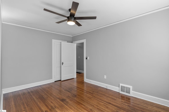 510 N Franklin Rd, Greenville, SC 29609 - spare room featuring visible vents, crown molding, ceiling fan, and wood finished floors